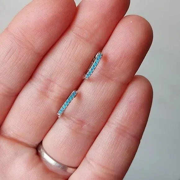 Platinum Plated 925 Sterling Silver Blue CZ Huggies Hoop Earrings - Picture 4 of 7